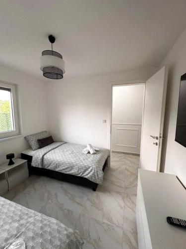 Ένα ή περισσότερα κρεβάτια σε δωμάτιο στο Holiday Home Norr