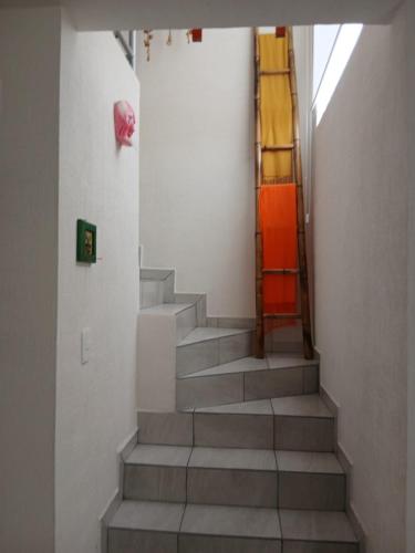 a staircase in a building with a stair case at Casa Termar in Machorra