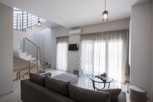 Μια τηλεόραση ή/και κέντρο ψυχαγωγίας στο Eunoia Luxury Villas