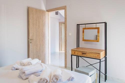 Ένα ή περισσότερα κρεβάτια σε δωμάτιο στο Eunoia Luxury Villas