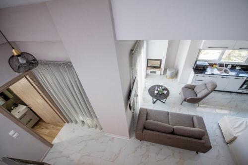 Χώρος καθιστικού στο Eunoia Luxury Villas