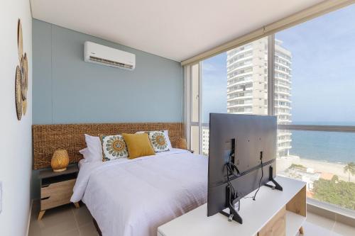 Μια τηλεόραση ή/και κέντρο ψυχαγωγίας στο U-GO Eira: Lujo y Serenidad Frente al Mar en Santa Marta