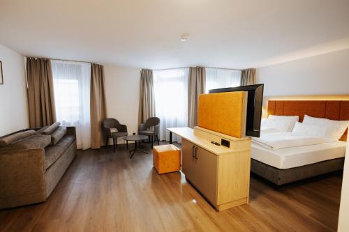 Un ou plusieurs lits dans un hébergement de l'établissement Hotel zwölf87