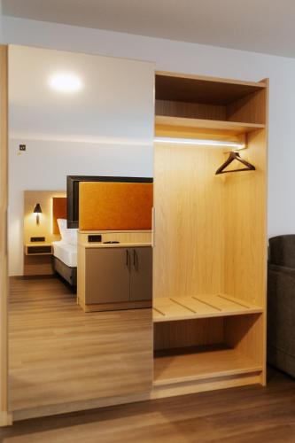 Un ou plusieurs lits dans un hébergement de l'établissement Hotel zwölf87