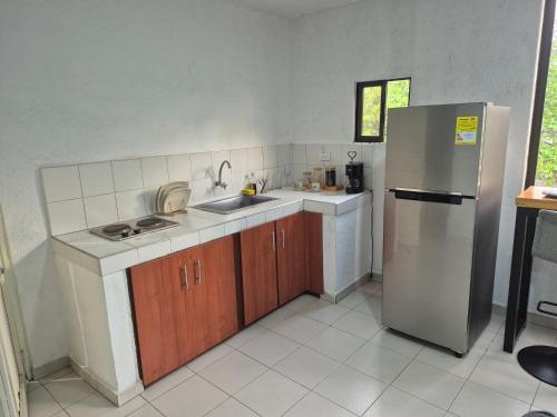 Kuchyň nebo kuchyňský kout v ubytování Apartaestudios Zona Norte Vipasa Cali