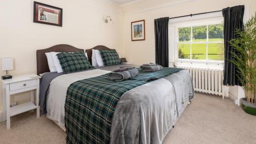 Dunfallandy House Hotelにあるベッド