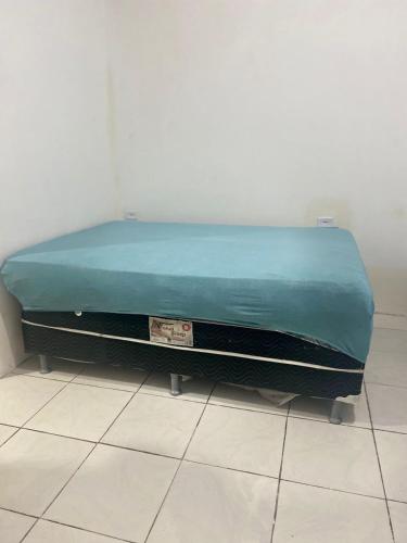 a mattress sitting on the floor in a room at Espaço de Iguaba Grande in Iguaba Grande