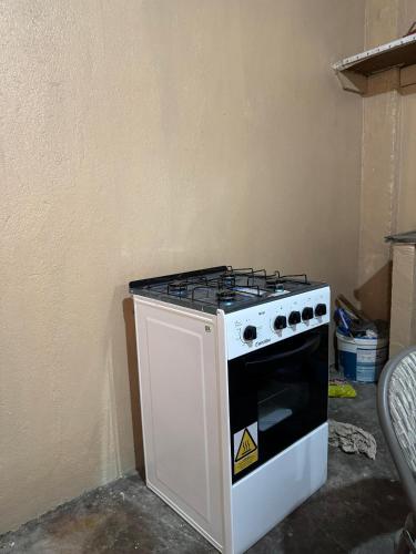 Dapur atau dapur kecil di Casa tranquila e segura