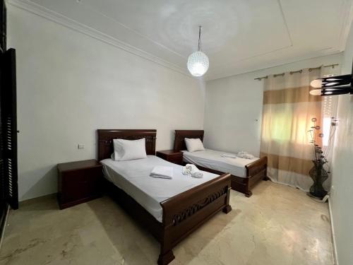 Una cama o camas en una habitación de Luxury central Apartment Casablanca - 2 Mars, City Center