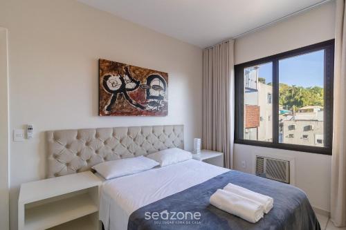 Voodi või voodid majutusasutuse Aptos em Condo com Piscina em Floripa - GVM toas