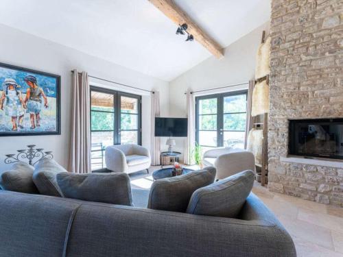 Телевизор и/или развлекательный центр в Domaine de Valmenon Comfortable holiday residence