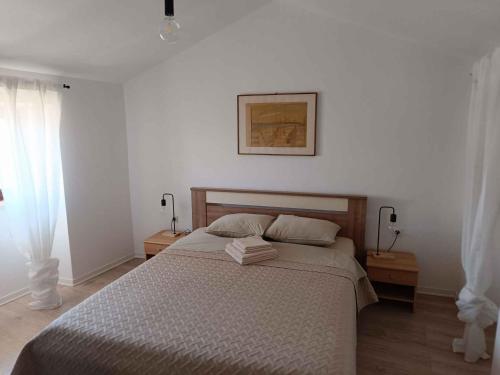 Postel nebo postele na pokoji v ubytování Holiday home in Moscenice 15209