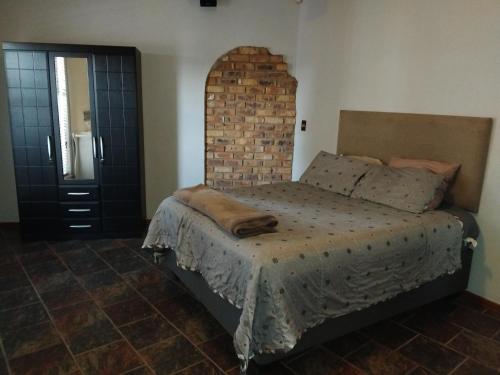 Ένα ή περισσότερα κρεβάτια σε δωμάτιο στο Heather Guest House