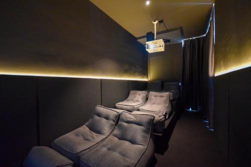 a room with two beds in a room at Macrolink Medini Theme Suite by Nest Home - Near Legoland in Iskandar Puteri