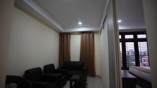 Zona de estar de ARARA GROUP Inn