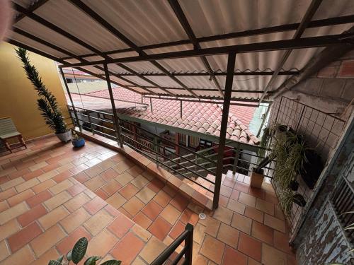 an overhead view of a patio with a roof at Hotel Balcon Tamesino in Támesis