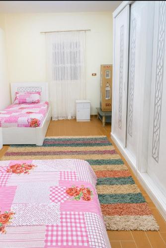 Katil atau katil-katil dalam bilik di Airport Retreat - Stylish Apartment Stay