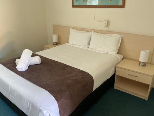 Postel nebo postele na pokoji v ubytování Bentleigh Motor Inn