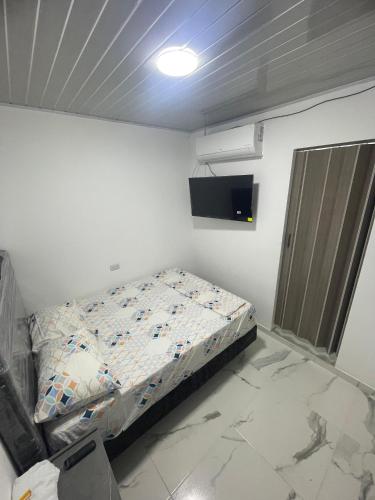 Un ou plusieurs lits dans un hébergement de l'établissement Hotel MONARCA