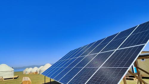 a solar panel on the side of a building at Yurt Camp Ali-Nur, Lake Song-Kul , Kyrgyzstan, Юрточный лагерь Али Нур, на берегу озера Сон Кол in Naryn