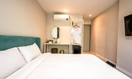 Katil atau katil-katil dalam bilik di Miryang Ever Miracle Hotel