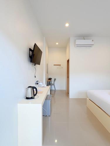 Μια τηλεόραση ή/και κέντρο ψυχαγωγίας στο Cozy House Chanthaburi