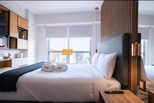 Ένα ή περισσότερα κρεβάτια σε δωμάτιο στο G15 Apartments by Vibrant