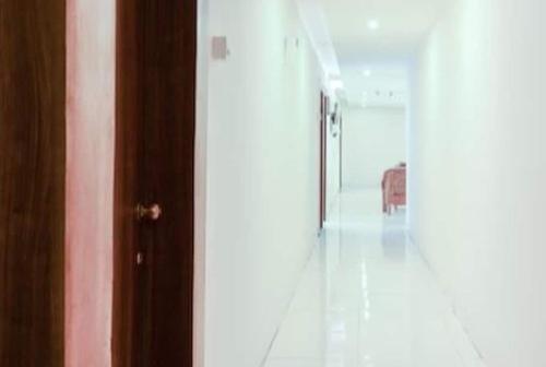 Φωτογραφία από το άλμπουμ του Hotel O Blue Inn σε Vagholi