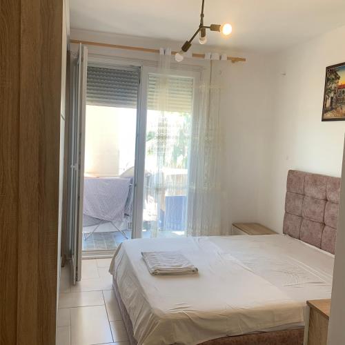 Katil atau katil-katil dalam bilik di Apartament with sea view