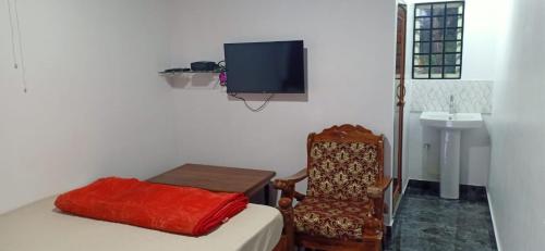 Μια τηλεόραση ή/και κέντρο ψυχαγωγίας στο Riverside view homestay