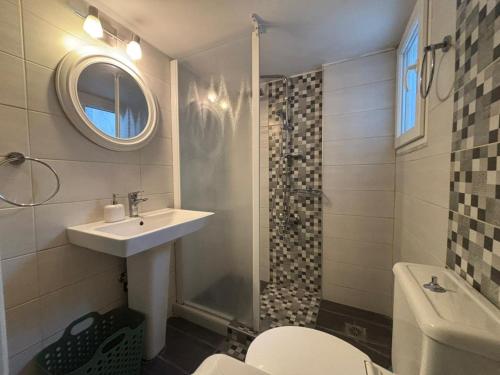 a bathroom with a sink and a shower and a toilet at Youth Shared Apt in the Center next to Metro in Athens