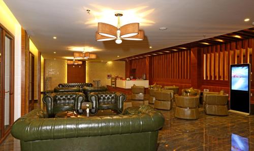 Χώρος καθιστικού στο Amber Dale Luxury Hotel & Spa, Munnar