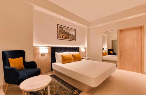 Postel nebo postele na pokoji v ubytování Hotel Zed -Near IGI-Airport-Terminal-3