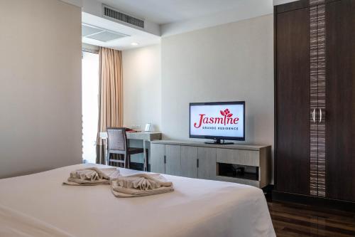 TV a/nebo společenská místnost v ubytování Jasmine Grande Residence