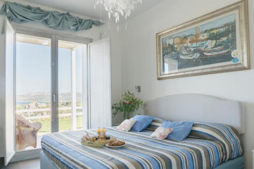 Ένα ή περισσότερα κρεβάτια σε δωμάτιο στο Tenuta Mongiardino