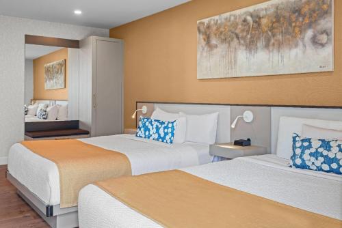 Ένα ή περισσότερα κρεβάτια σε δωμάτιο στο Days Inn by Wyndham Riviere-Du-Loup