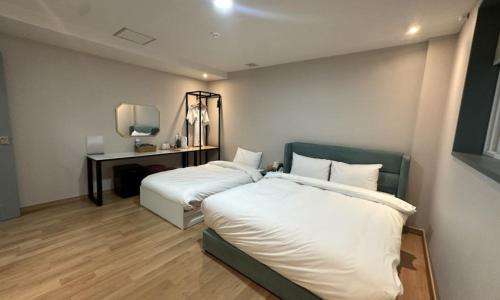 Katil atau katil-katil dalam bilik di Miryang Ever Miracle Hotel