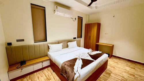 Postel nebo postele na pokoji v ubytování Hotel Hill7 Inn