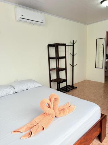 En eller flere senge i et værelse på Estancia Rincón Verde