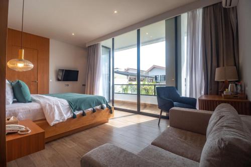 Giường trong phòng chung tại Octa Canggu Villa and Condotel