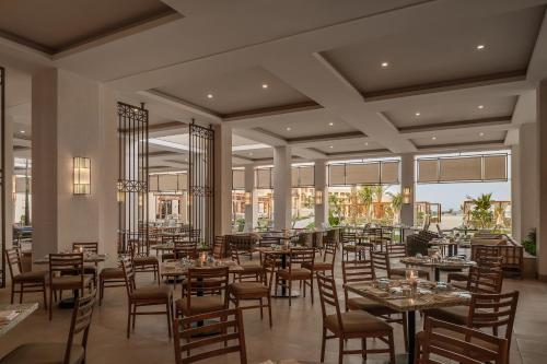 Restaurant ou autre lieu de restauration dans l'établissement JAZ Elite Asteria