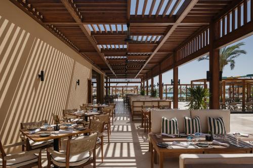 Restaurant ou autre lieu de restauration dans l'établissement JAZ Elite Asteria