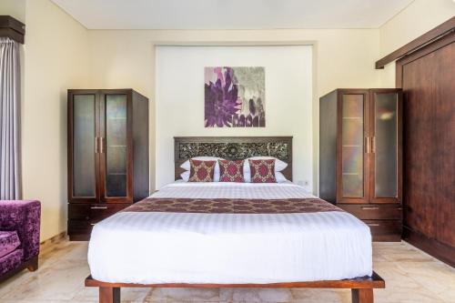 Ένα ή περισσότερα κρεβάτια σε δωμάτιο στο Athena Romantic 1br Pool Villa SANUR