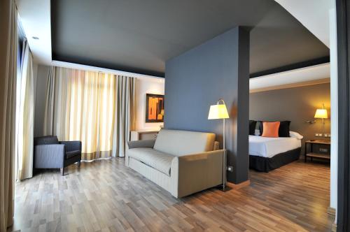 Ένα ή περισσότερα κρεβάτια σε δωμάτιο στο Hotel Jazz