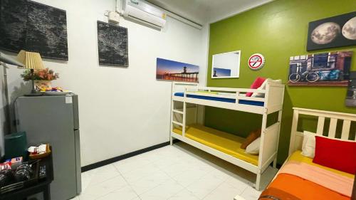 Ένα ή περισσότερα κρεβάτια σε δωμάτιο στο Beach Gallery House