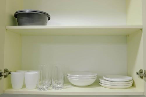Jasmine Lux Apartmentにあるキッチンまたは簡易キッチン