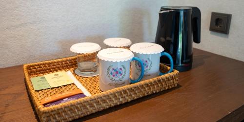 Kaffee-/Teezubehör in der Unterkunft Ecoland Hotel