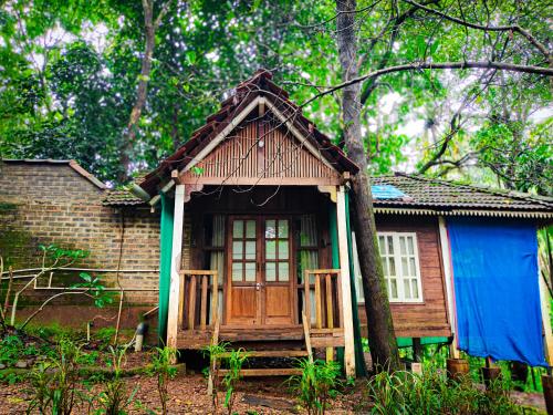 Κήπος έξω από το Tanshikar Spice Farm Cottages