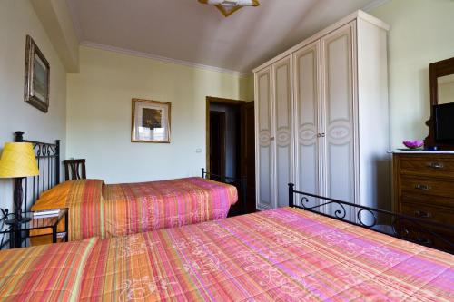 Katil atau katil-katil dalam bilik di B&B Roma Appia Davila25