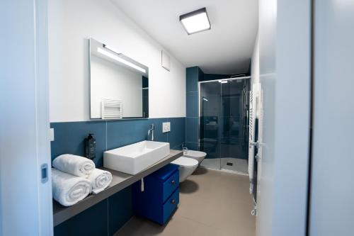 Ένα μπάνιο στο BASALTO Venice Mestre Apartments